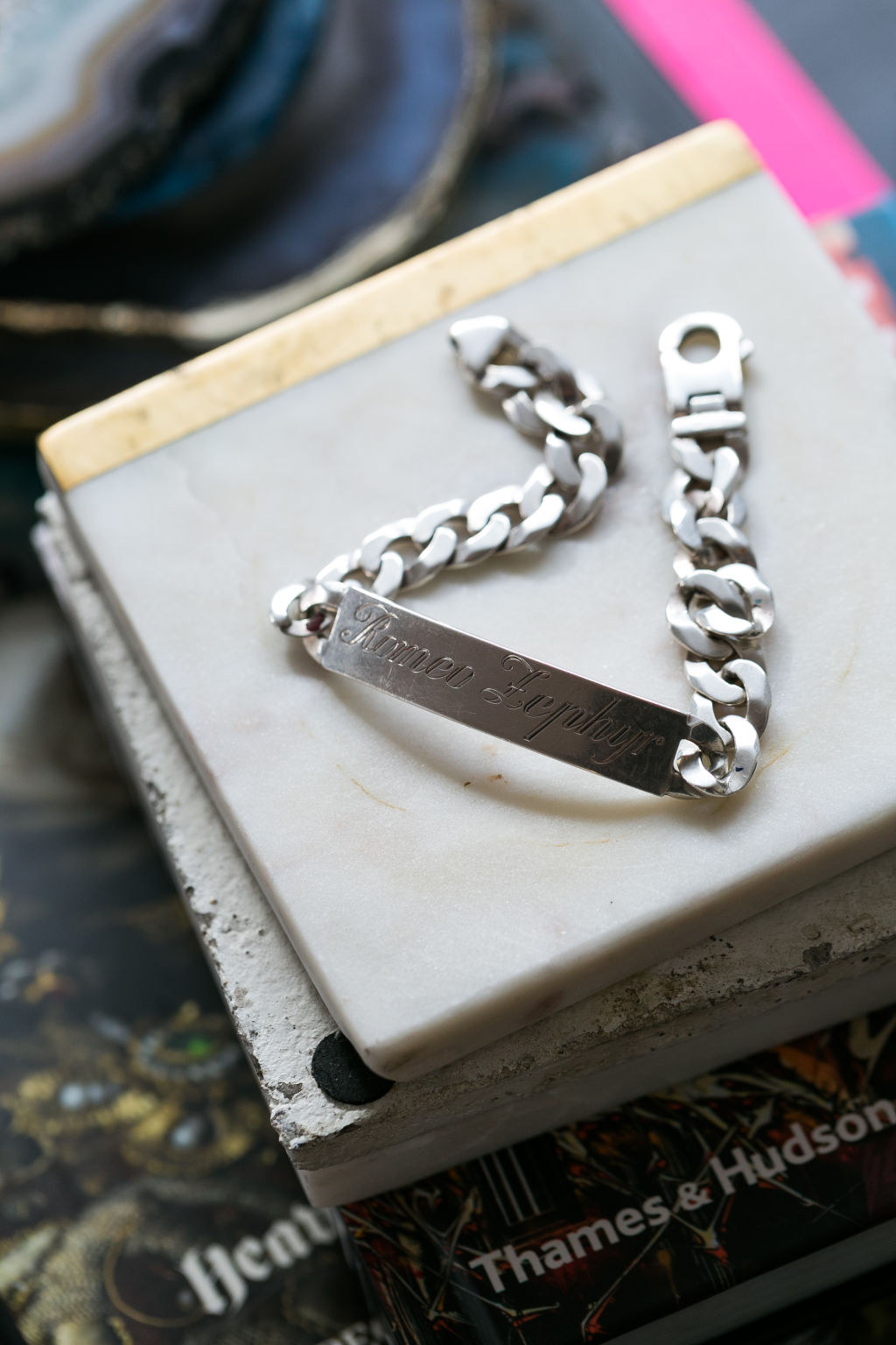 Adnate's wife Jess had this bracelet made for him after the birth of their son. Photo: Parker Blain.