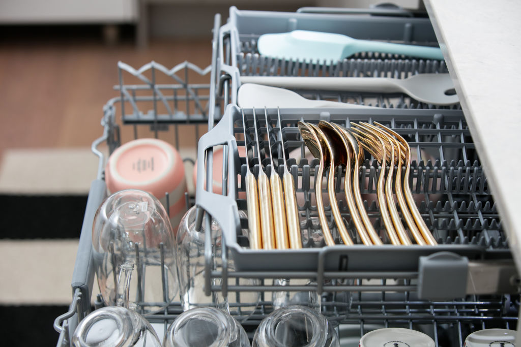 Many people have their own preferred way of stacking a dishwasher. Photo: Smeg