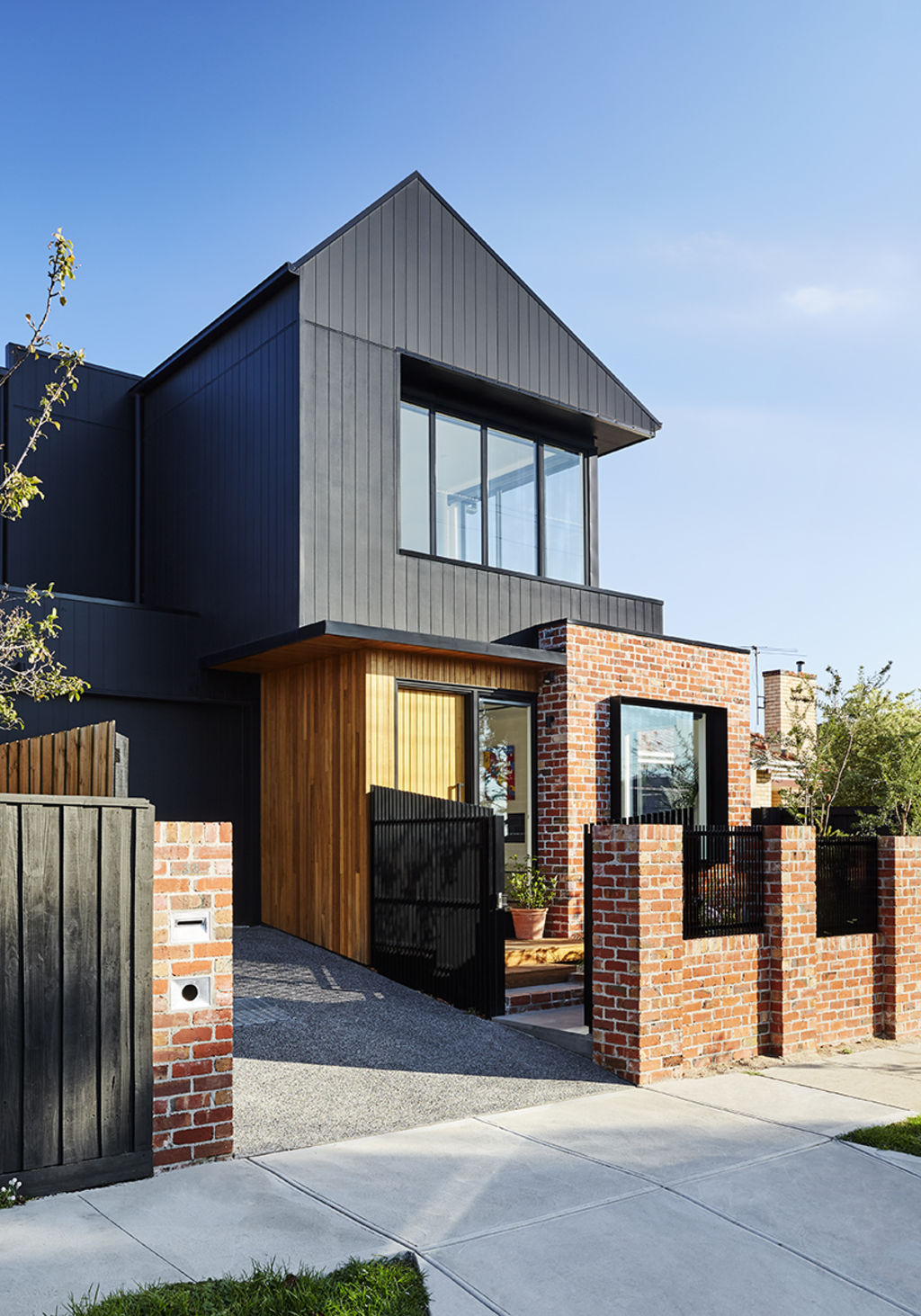 The generosity of window provision is a nod back to the mid-century times. Photo: Tess Kelly