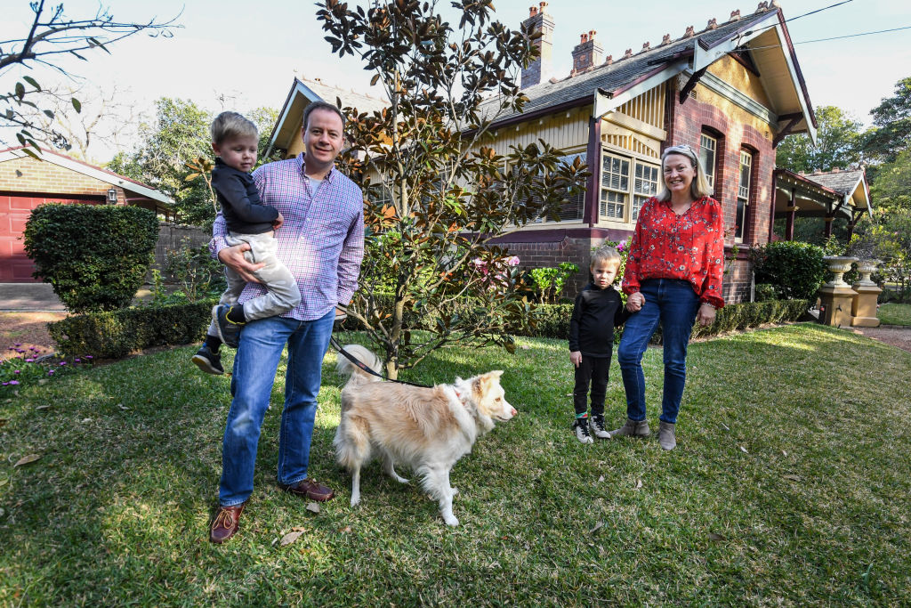 ohn and Christine Greig, pictured with sons Peter and Jack, bought a house in Haberfield this week after spending months looking for a property to upgrade to. Photo: Peter Rae