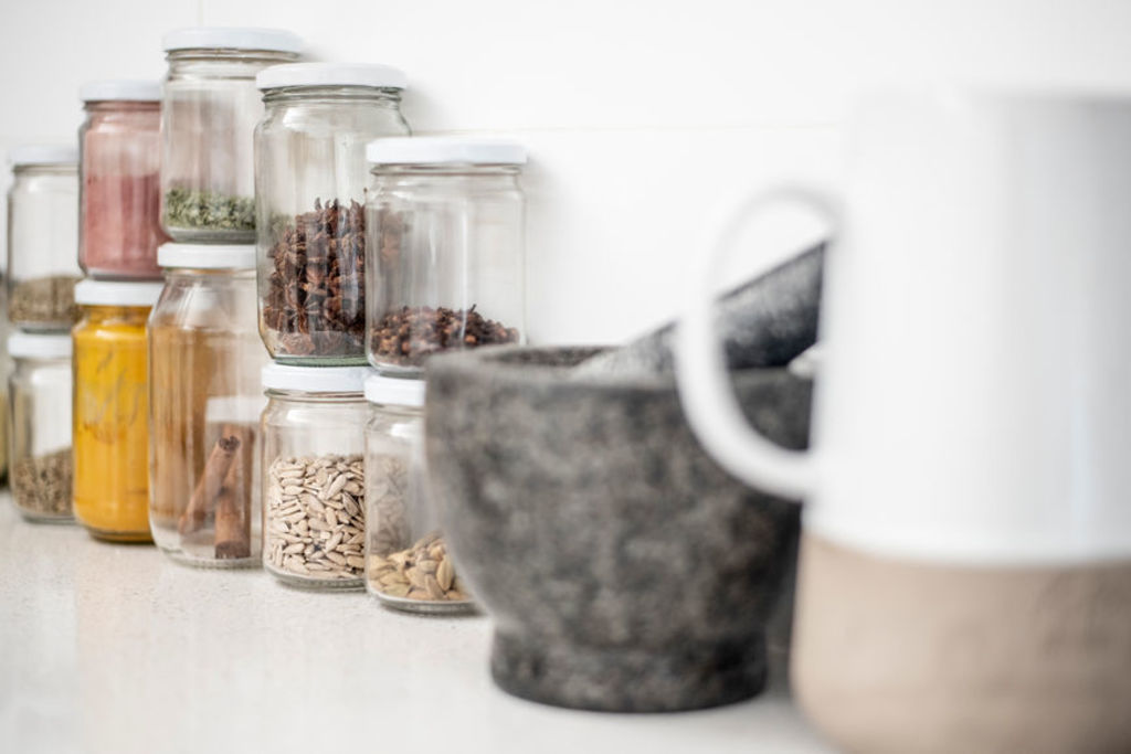 Secondhand cups and glassware are staples of the zero waste movement. Photo: Stocksy