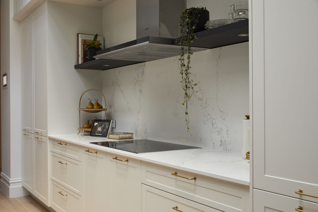 A rangehood suited to a gas cooktop won't work as well with an electric or induction cooktop, like the one in Andy and Deb's kitchen. Photo: Channel Nine