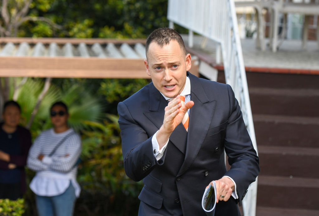 Andrew Cooley of Cooley Auctions calls for final offers before the home sold. Photo: Peter Rae
