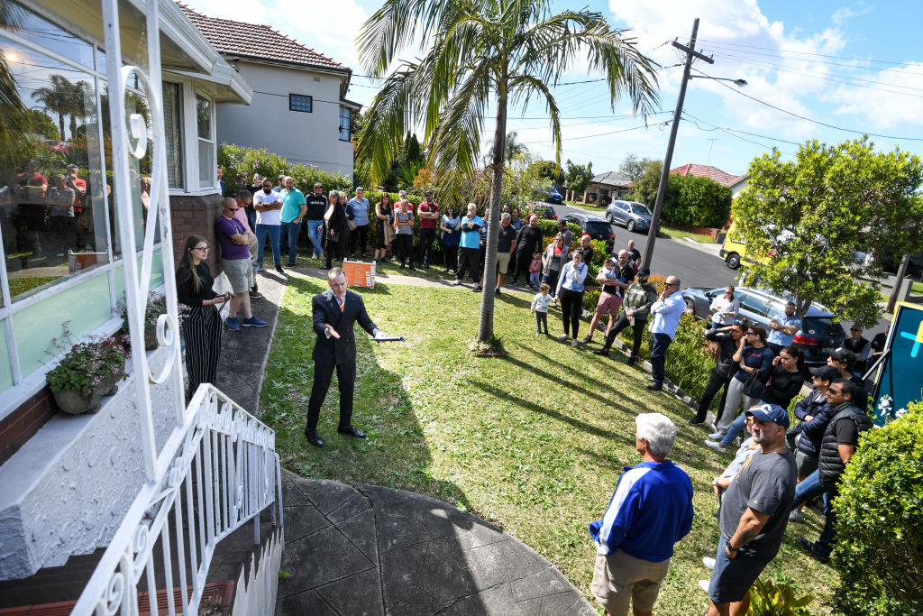 Auctioneer Andrew Cooley from Cooley Auctions in action at 9 Bobadah Street, Kingsgrove. Photo: Peter Rae