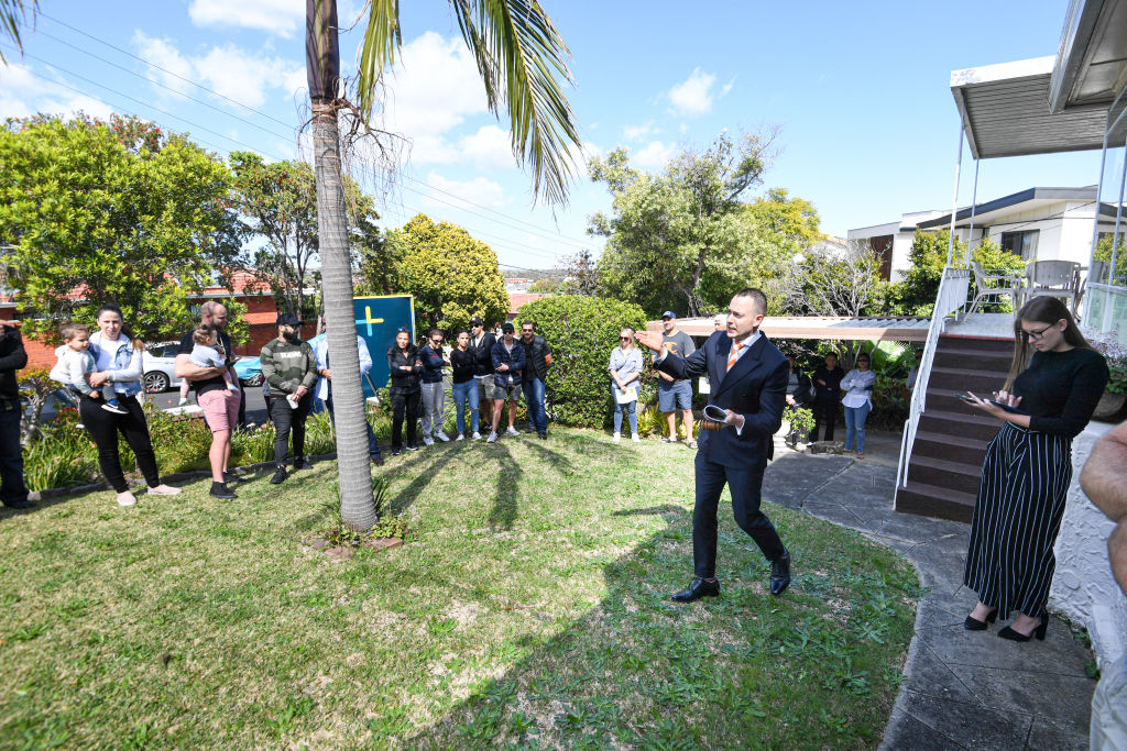 Auctioneer Andrew Cooley from Cooley Auctions in action at 9 Bobadah Street, Kingsgrove.
