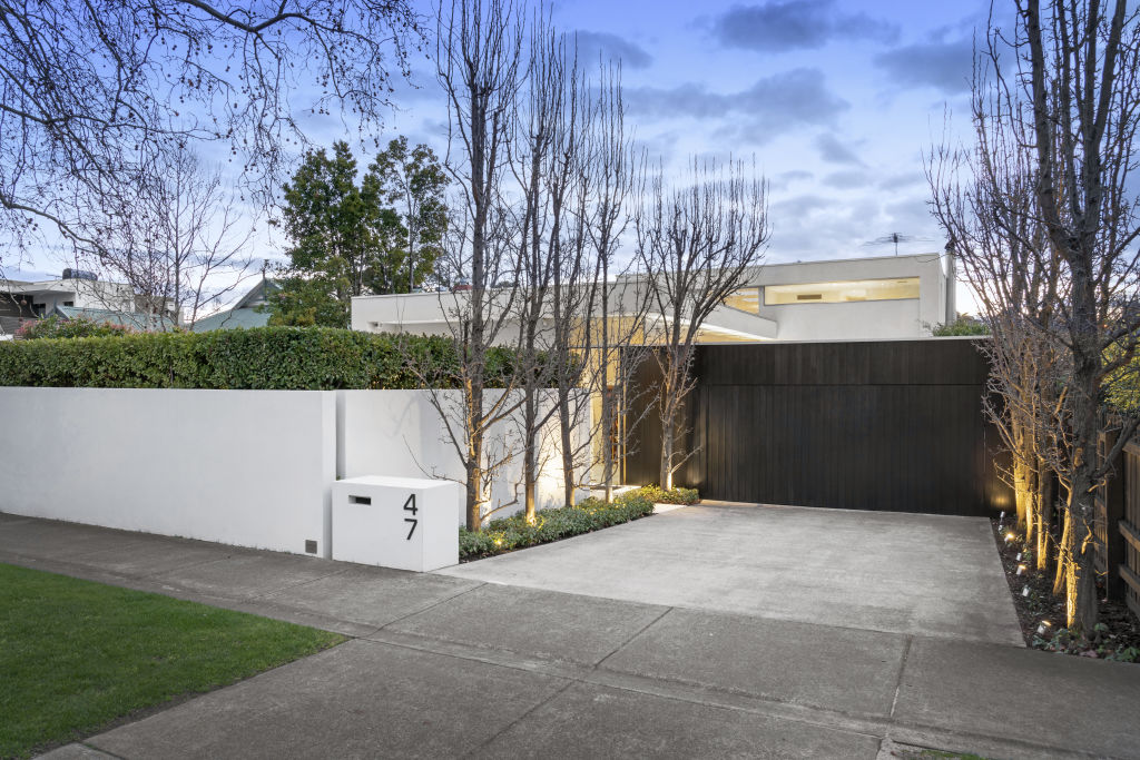 The facade is sleek and understated with an ample driveway. Photo: Marshall White.