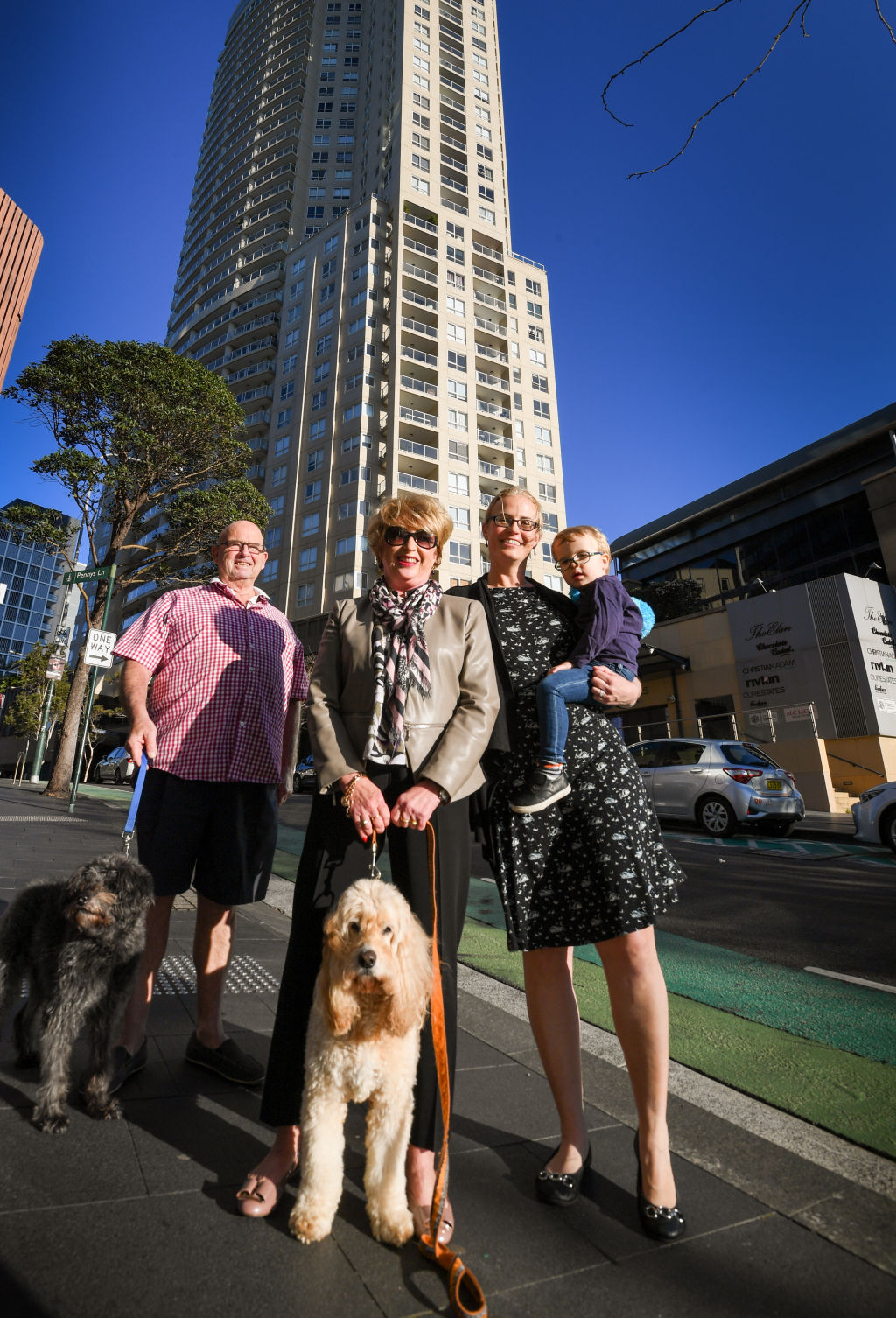 Bob Roden from Elan apartments with his daughter's dog Doogie,  Colleen Cranney (with her dog Brinsley) and Claire Hooper with her son Edwin. Photo: Peter Rae