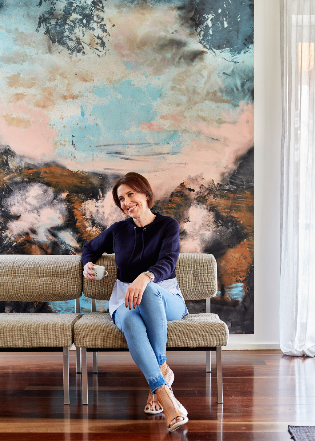 The modern two-storey townhouse is filled with art.  Photo: Amelia Stanwix.