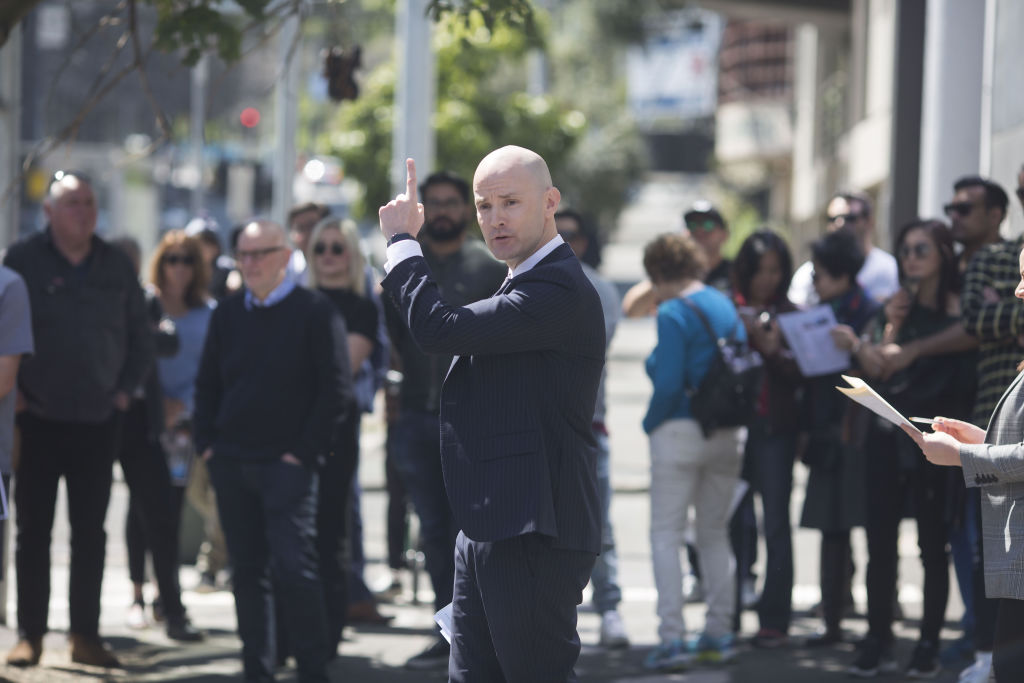 Rohan White conducts the South Melbourne auction. Photo: Stephen McKenzie