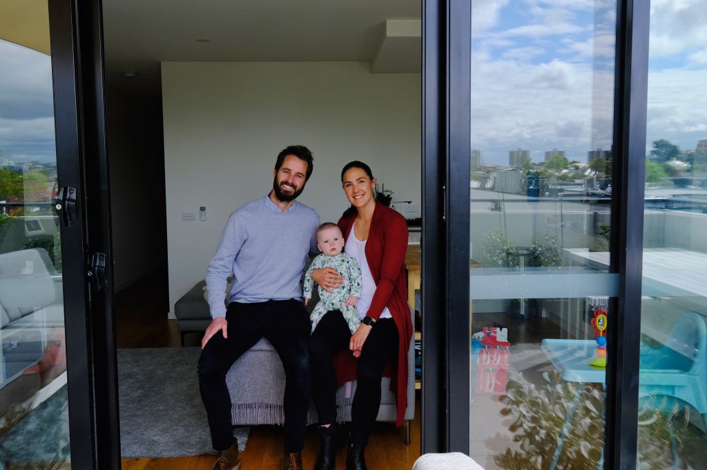 James McCubbin and Harriet Deans, with baby Alfred, are renting a new unit after finding the houses for rent in their area were run down. Photo: Luis Enrique Ascui