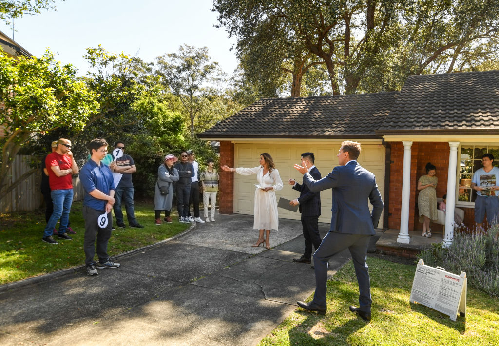 There was competitive bidding at the auction of the run-down house at 8 Davis Avenue, Epping. Photo: Peter Rae