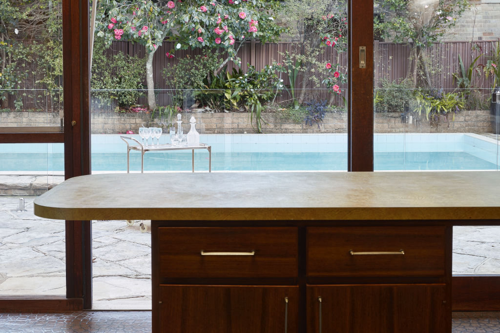 Known as Welch House in St Ives, this modernist family home wrapped around a pool is on the market. Photo: Supplied.