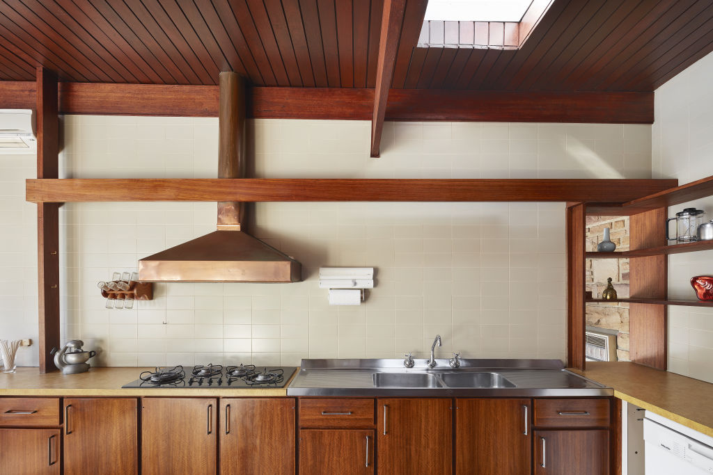 Timber joinery is a highlight in the finely-crafted kitchen. Photo: Supplied.