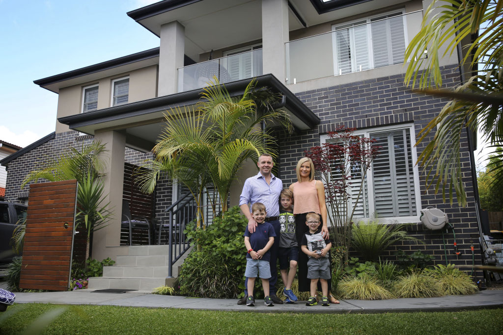Matt and Kasey Hughes with boys Nash (5), Ryder (9) and Madden (3) have put their North Ryde home on the market, after holding off during the downturn. Photo: James Alcock