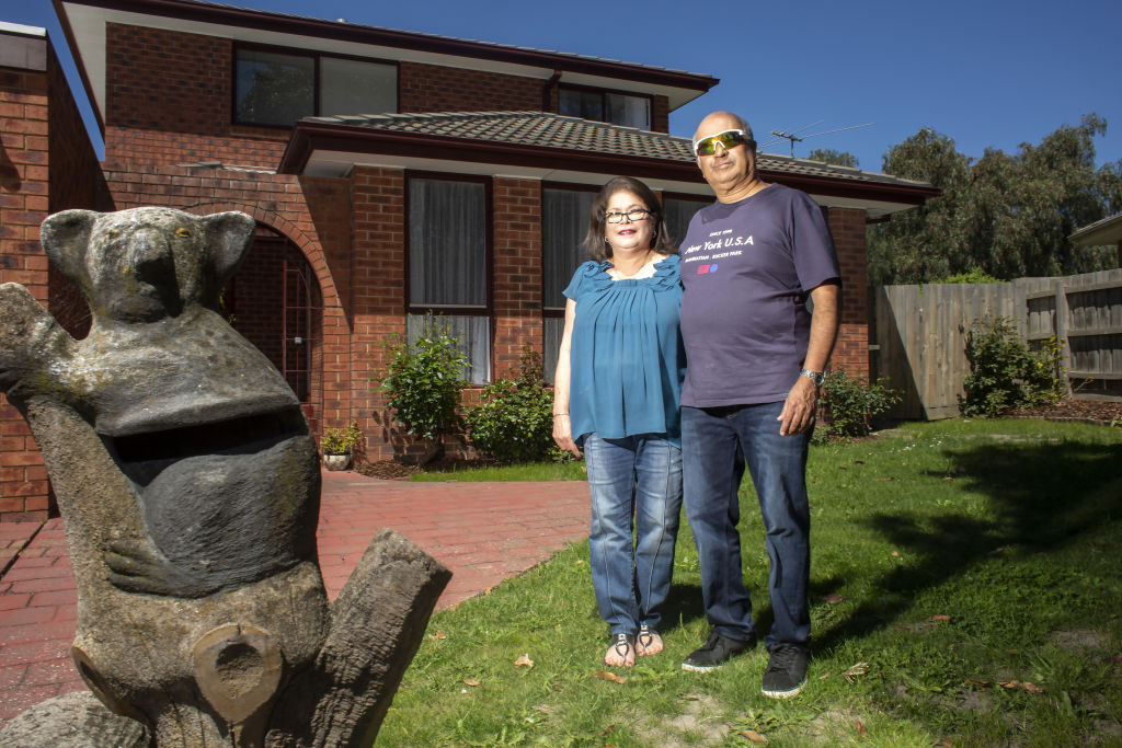 Roger and Penny Theodore outside the property they are selling in Rowville. Photo: Stephen McKenzie