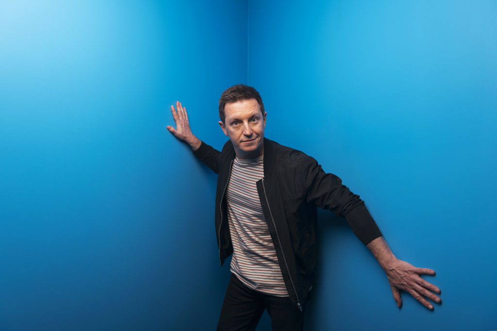 Rove McManus enjoys reading some of his favourite books to five-year-old daughter Ruby. Photo: James Brickwood