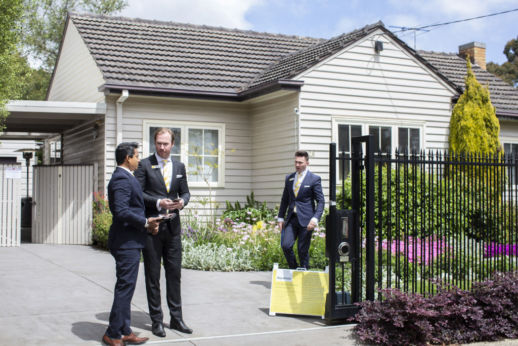 Agents from Ray White Forest Hill set up for the auction of 26 Carinya Road, Vermont. Photo: Stephen McKenzie
