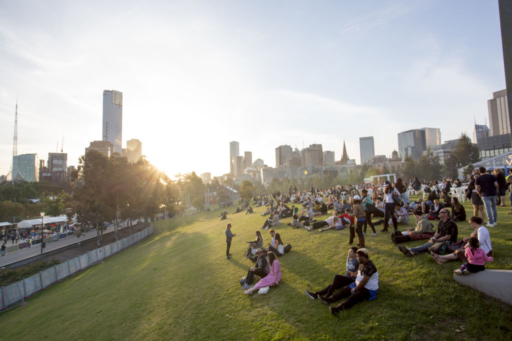 Noodle lovers tuck in on the grass at Birrerung Marr. Photo: Supplied.