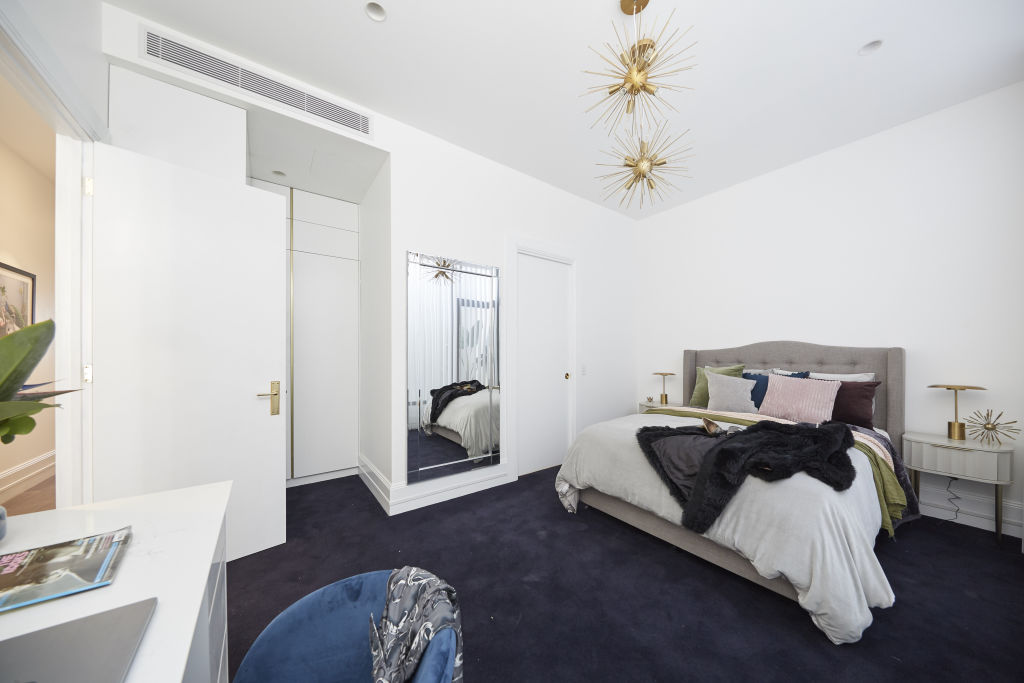 The fur coat, throw and shoes on the bed speak to set design, not practical design. Photo: Channel Nine