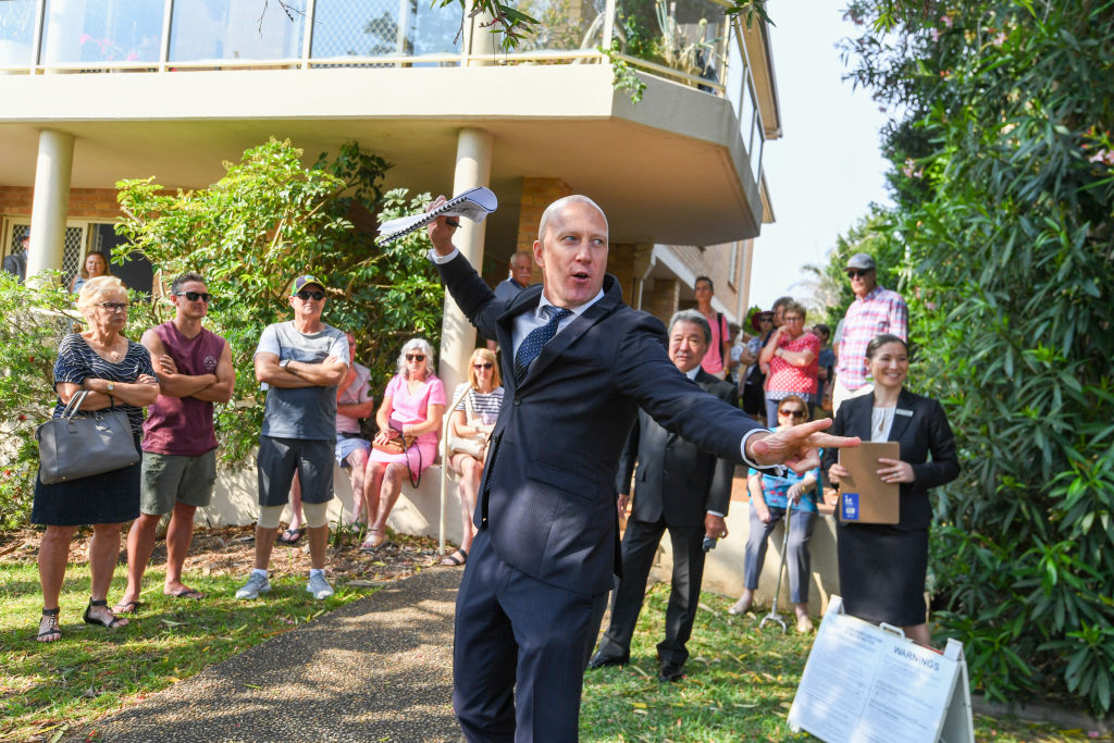 Buyers routinely fork out more than reserve to buy homes at auction. Photo: Peter Rae