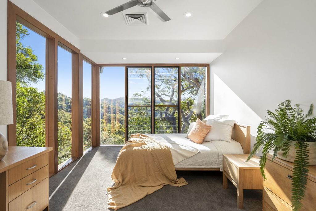 Sleep in the treetops in one of the home's six bedrooms.
