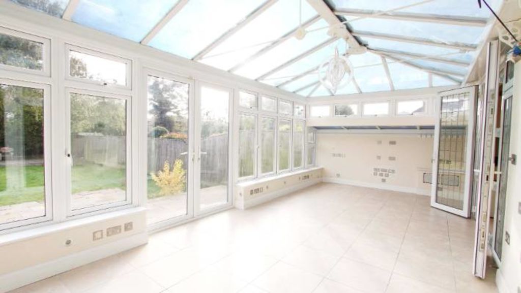 The detached home promises a family-friendly location, bright spaces and a conservatory leading to a patio area and spacious garden Photo: ANDREW PEARCE ESTATE AGENTS AND