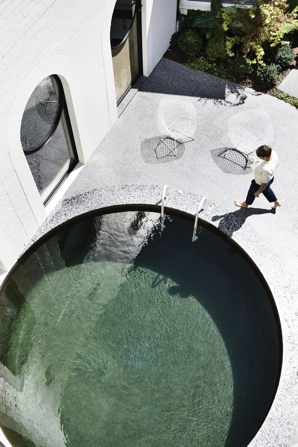Kennedy Nolan achieved integration of the pool on the property by creating using a circular shape. Photo: Derek Swalwell