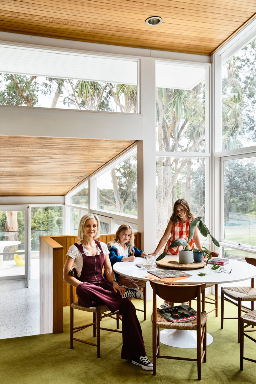Katie Brannaghan with her daughters, Milla (12) and Yvie (9). The ‘music room’ surrounded by huge double height windows. Photo: Derek Swalwell
