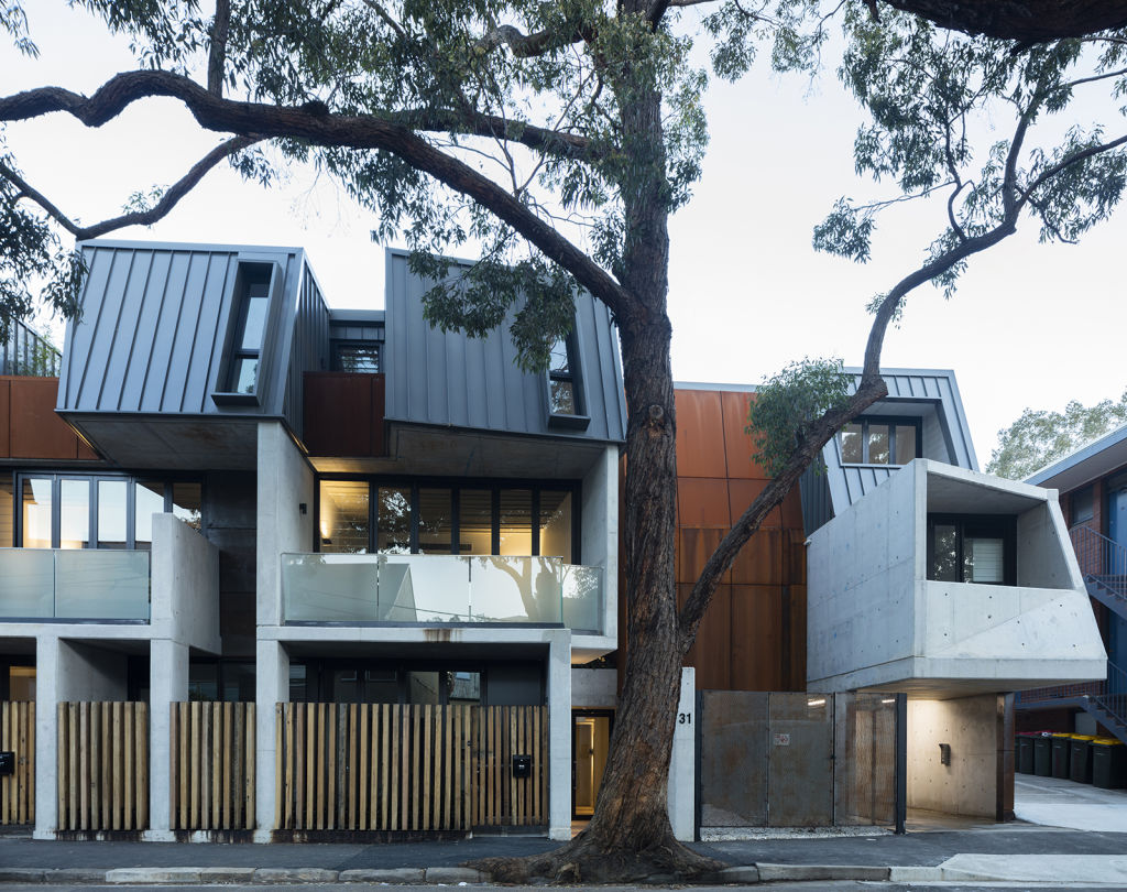 With a raised and setback third storey in what is essentially a two-level and typical terrace neighbourhood, here is an aesthetically-appealing building 'with a roof form which is kind of like a modern terrace with a dormer'. Photo: Brett Boardman