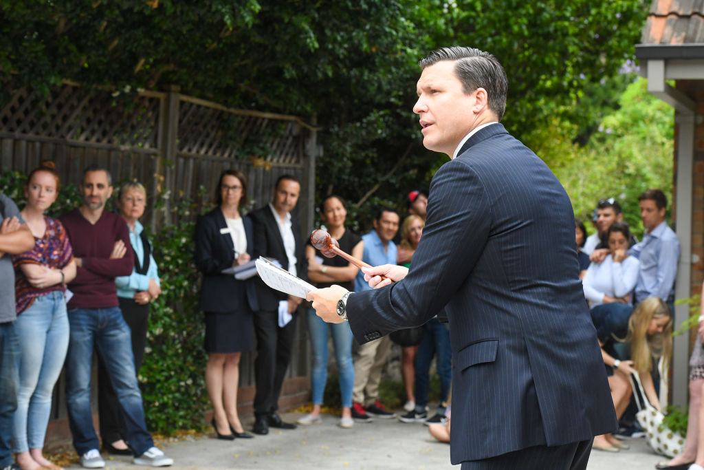 Mr Matthews prepares to bring down the hammer after a two-party bidding battle. Photo: Peter Rae