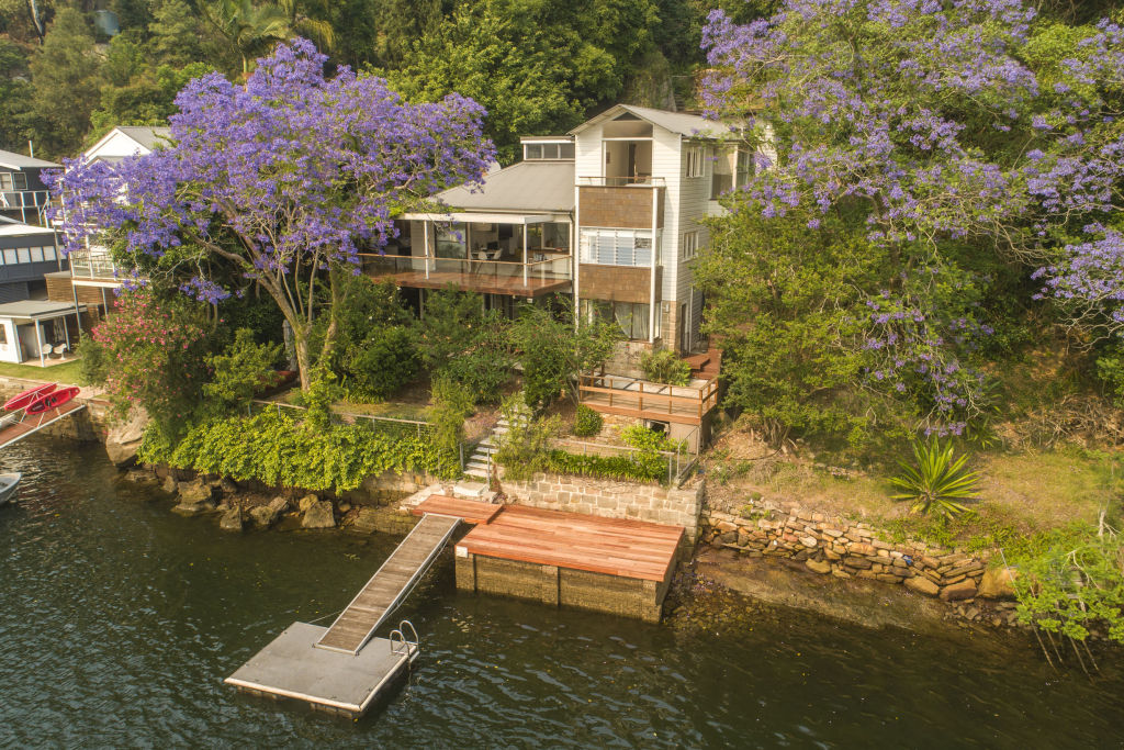The three-level house has a private jetty and is set on the edge of the Berowra Valley National Park. Photo: Supplied.
