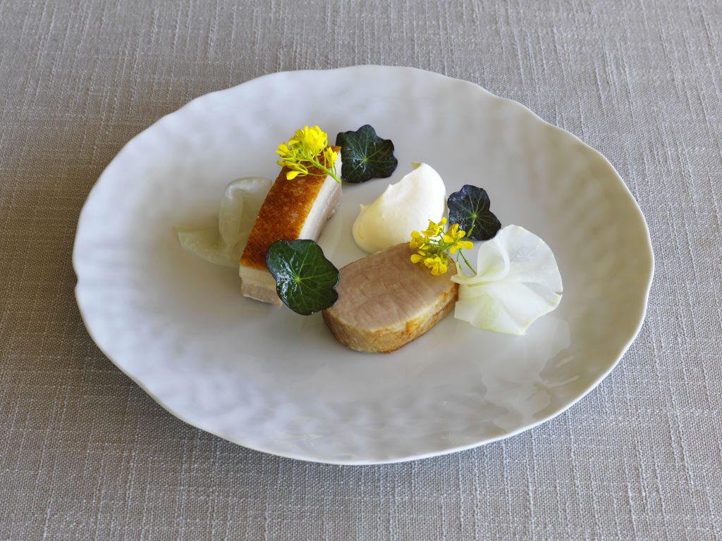 Roast Bundarra pork belly loin, smoked eel, white balsamic, kohlrabi, mustard leaf at Ten Minutes by Tractor, Mornington Peninsula. Photo: Jason Loucas.