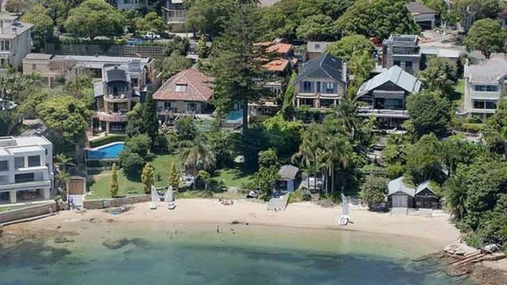 There are only seven houses on Vaucluse's Kutti Beach, of which one (far right) has been bought by Shay Lewis-Thorp and her husband Alex Thorp for about $32 million.