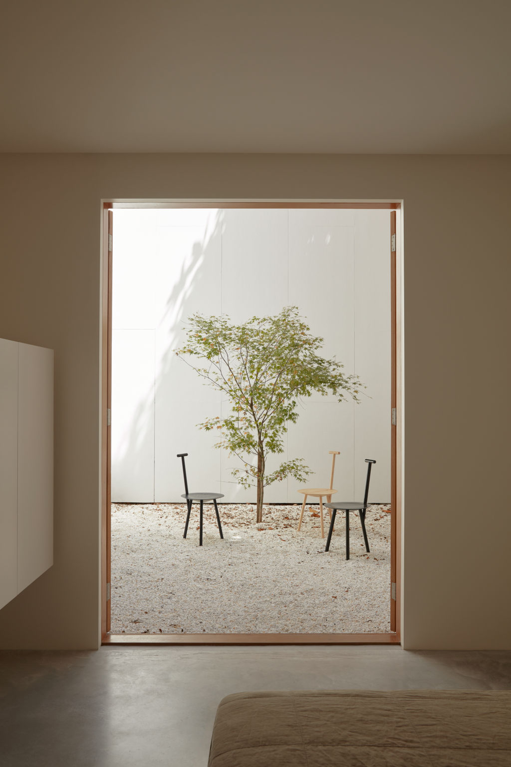 Clever design means there's enough room for a meditative courtyard, which helps bring fresh air inside the skinny home. Photo: Tom Ross
