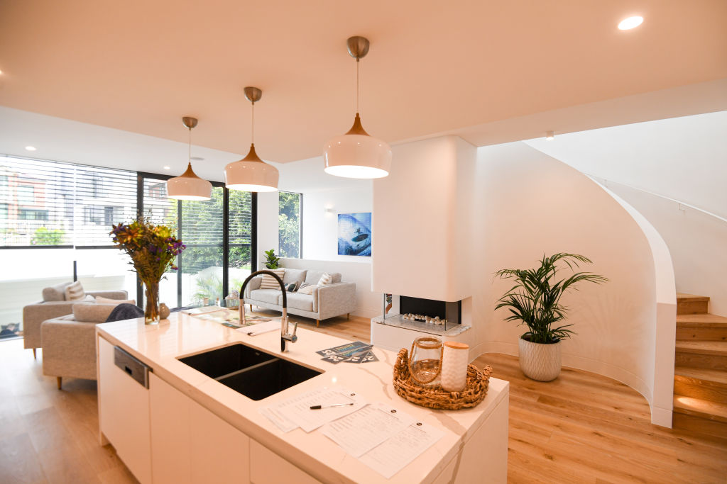 The kitchen and living area of 12 Campbell Street, Clovelly. Photo: Peter Rae