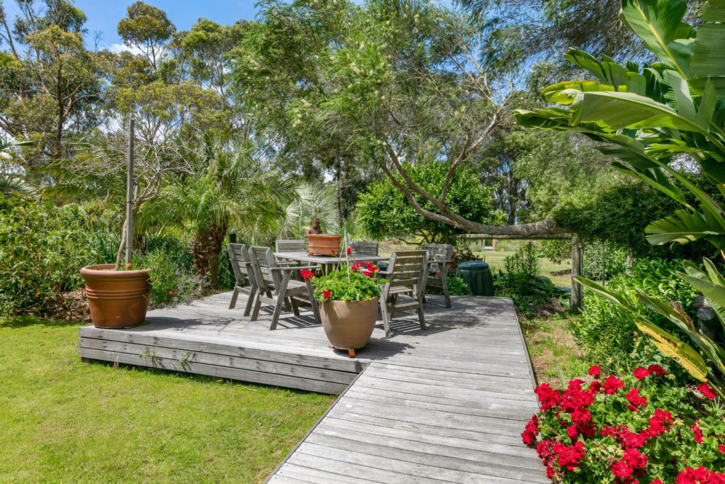 The gardens surrounding the Merricks Road home have a blend of tropical and native plants. Photo: Supplied