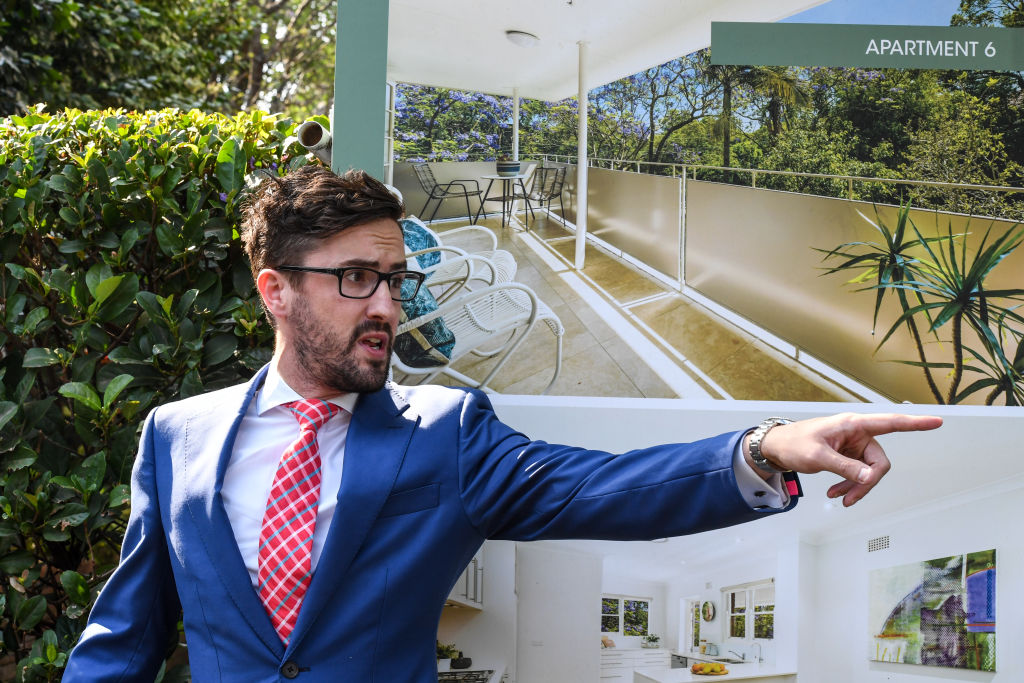 Auctioneers, like Belle Property's Andrew Robinson (auctioning in December last year) will need to be camera ready. Photo: Peter Rae