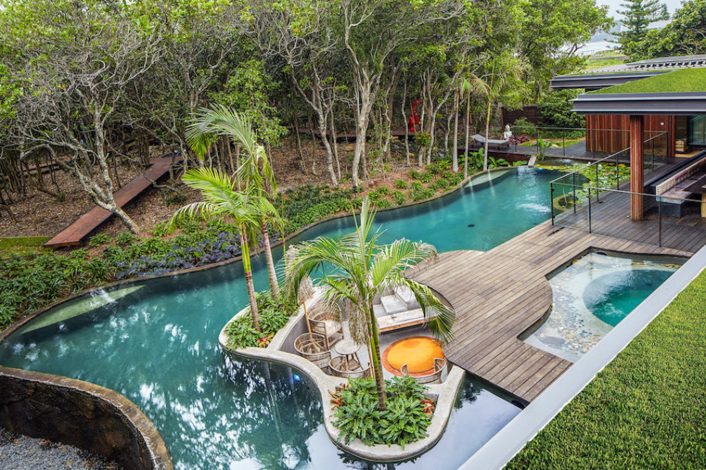 Water features and spas can easily move your mid-range budget into a luxury one.  Photo: Natural Swimming Pools Australia