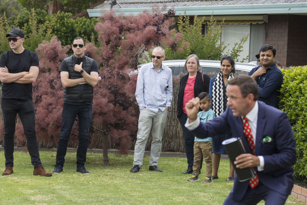 The sale of the home attracted a decent-sized crowd.  Photo: Stephen McKenzie