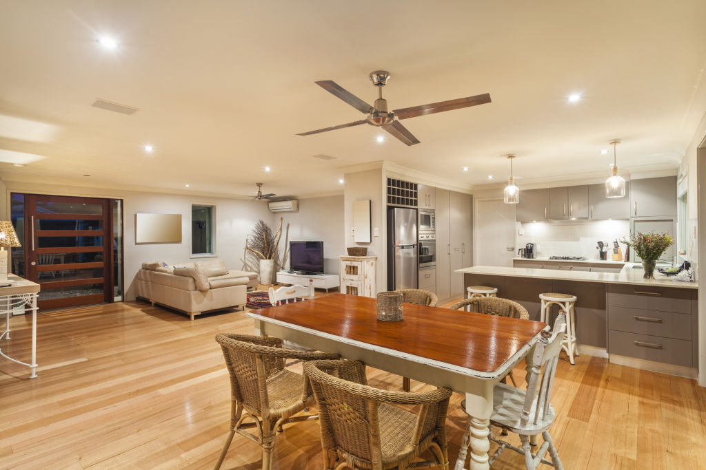 Ceiling fans are cheaper to run than airconditioners. Photo: iStock