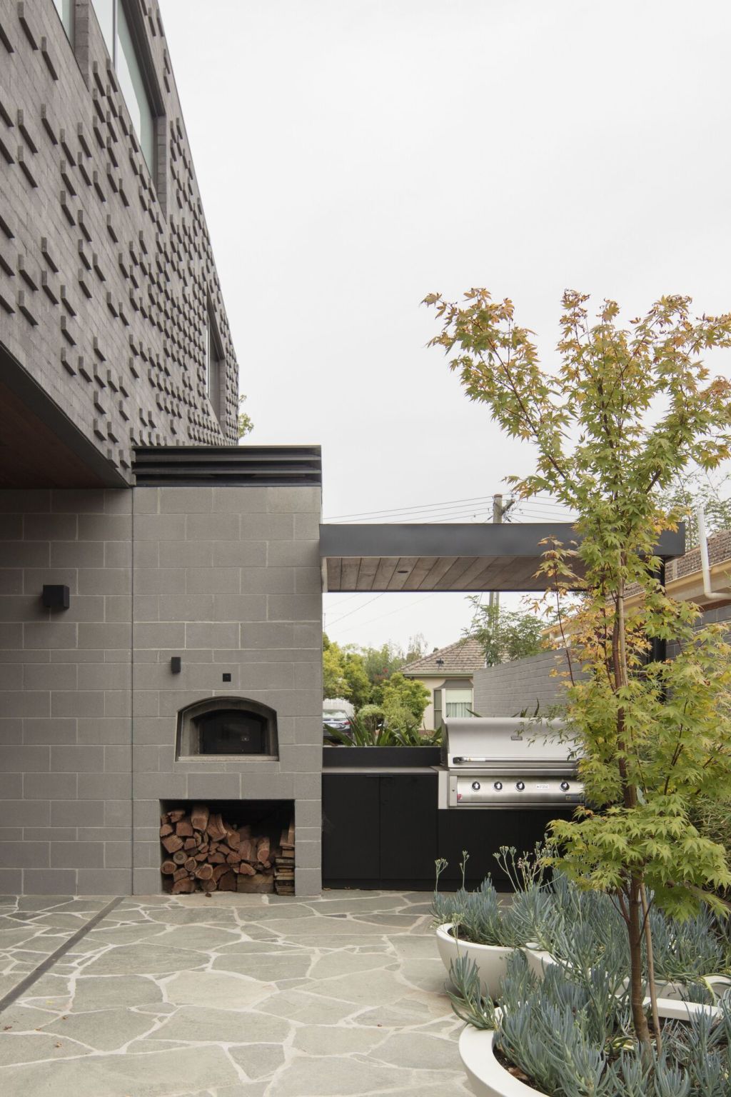 The outdoor barbecue area with pizza oven. Photo: Ben Hosking