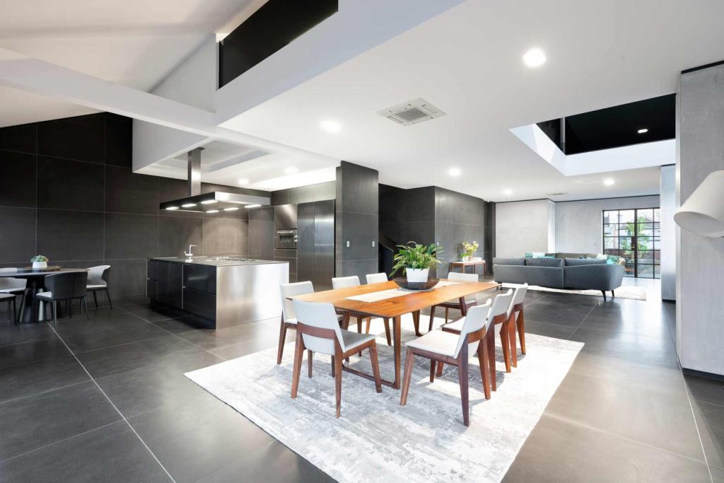 There are modern kitchens and multiple living areas. Photo: Watermark Real Estate