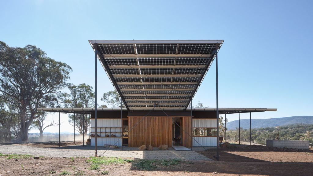 The carport roof uses solar panels in a unique application. Photo: Barton Taylor