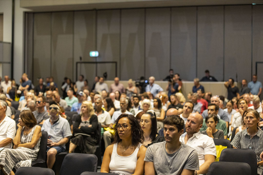 The crowds at RACV Royal Pines on Saturday, where $17 million worth of property sold under the hammer. Photo: Glenn Hunt