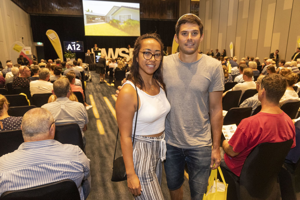 Laura Stevens and William Grange at the Ray White The Event Auction at RACV Royal Pines Resort, Gold Coast. Photo: Glenn Hunt