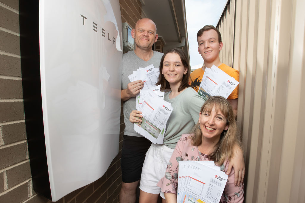 Winners are grinners: the Pfitzner family have gone on holidays with the money they've saved on power bills. Photo: Chris Pavlich