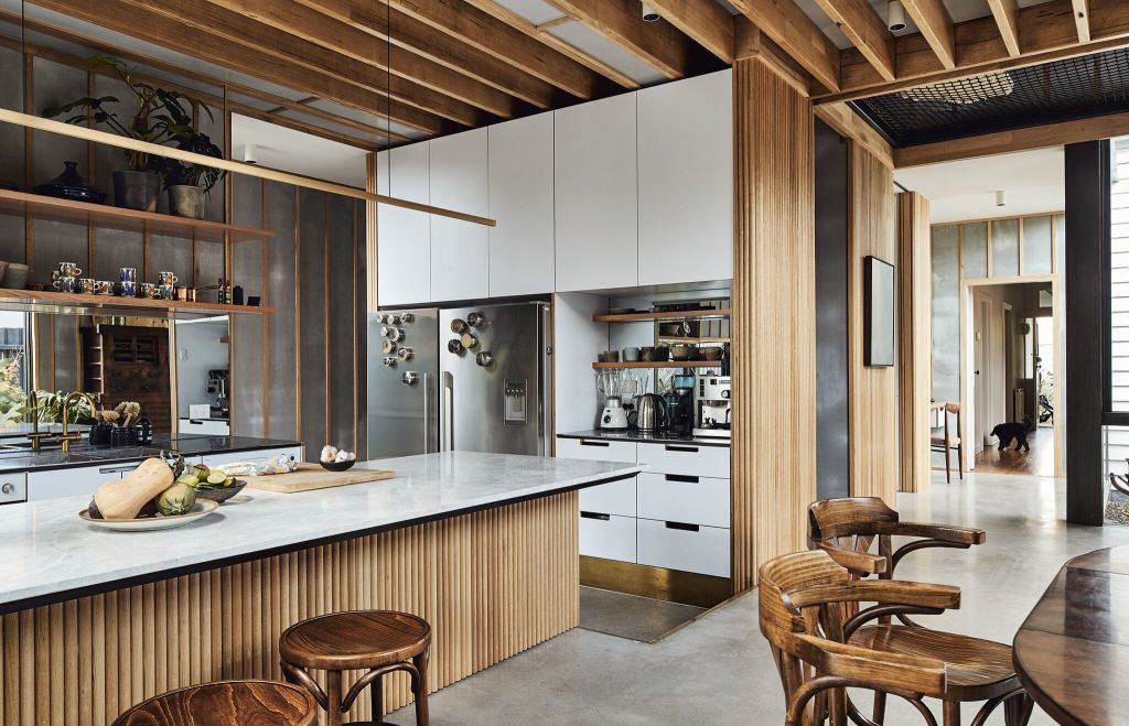 The kitchen is set one step lower. Photo: Peter Bennetts