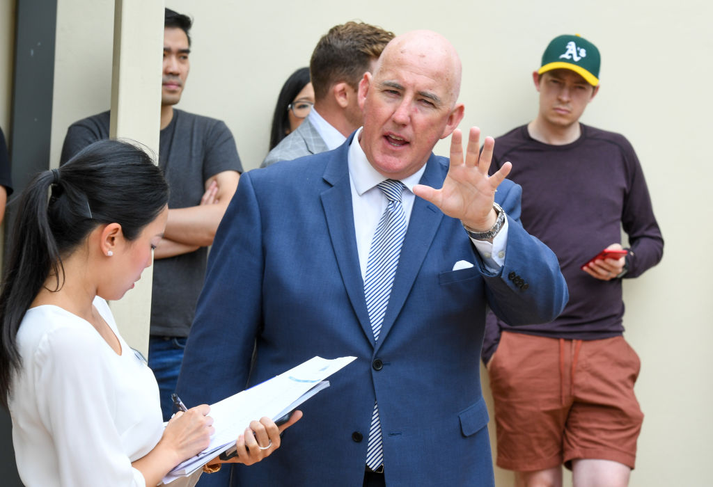 Auctioneer Nicholas Lyell prepares to sell the Lane Cove home. Photo: Peter Rae