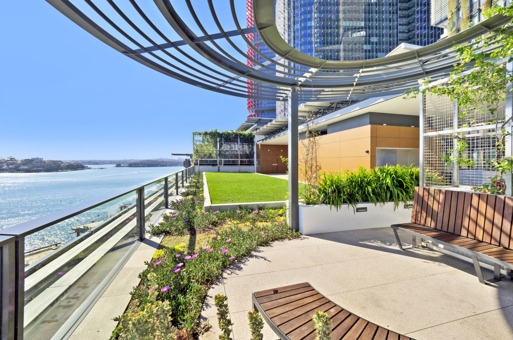 The one-bedroom apartment has harbour views and interiors by Smart Design Studios.