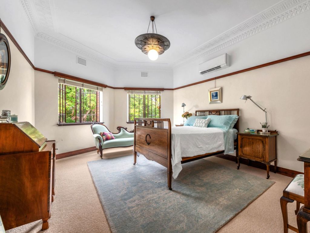 The bedrooms are spacious, light-filled and beautifully restored. Photo: Ray White New Farm